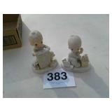 2 precious moments figurines