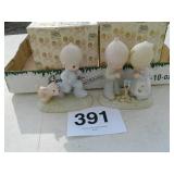 2 precious moments figurines