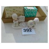 2 precious moments figurines
