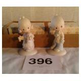 2 precious moments figurines