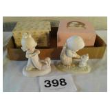 2 precious moments figurines