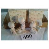 2 precious moments figurines