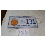 2 MATCHING WINDSOR LICENSE PLATES, UNOPENED