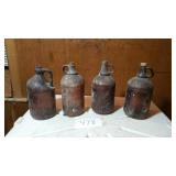 4 BROWN GLASS JUGS