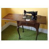 antique Singer cabinet sewing machine