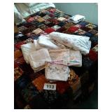 LOT OF QUEEN SIZED SHEETS & PILLOWCASES
