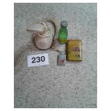 Flint lock lighter, old microphone, squirt bottle