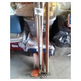 SHOVEL, RAKES, HOES, ETC, IN TRASH CAN