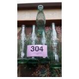 5 VINTAGE COCA COLA BOTTLES