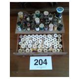 SMALL ORGANIZER FULL OF THREAD