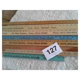 LOT OF YARDSTICKS