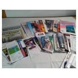 BOX FULL OF TRAVEL GUIDES AND MAPS