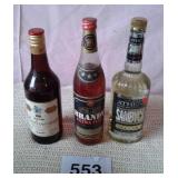 3 BOTTLES BRANDY, LIQUEUR, RUM ..SEALED