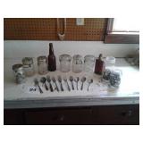 Old fruit jars and flatware setter