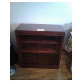 BOOK SHELF WITH SLIDING GLASS DOORS