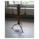 Cast iron candle stand