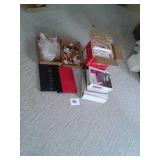 Box of paper folders binders refrigerator magnets