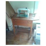 New home cabinet sewing machine