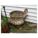 Old cast-iron flower pot handle broke off of one