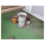 Flower pots and crock, crock is cracked