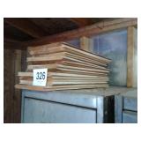 Small stack of tongue and groove pine Lumber also
