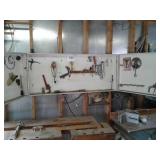 Tools inside of hanging wall cabinet wrenches