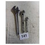Adjustable wrenches
