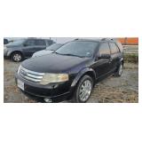 2008 Ford Taurus X 1FMDK06W78GA06576 Arrest/KEY
