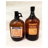 Two Brown Glass Apothecary Gallon Jugs