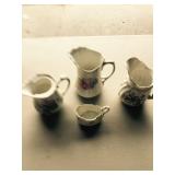 Four Vintage/Antique Pitchers