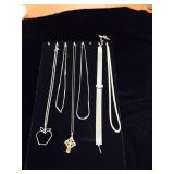 6 Silver Toned Necklaces