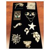 9 Silver Toned Brooches