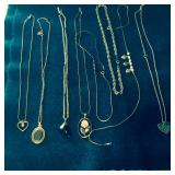 8 Gold Toned Necklaces