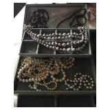 Group of Black, White, and Silver Beads