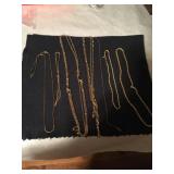 Seven Gold Toned Chain Necklaces