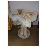 CONCRETE IN SHAPE OF BOOTS AND STATE OF TEXAS