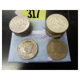 GROUP OF 11 KENNEDY SILVER CLAD HALF DOLLARS