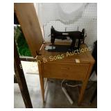 ANTIQUE DOMESTIC SEWING MACHINE ON STAND.