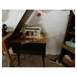 VINTAGE KENMOORE SEWING MACHINE ON STAND.