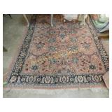 108" X 76" AREA RUG.