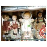 GROUP OF 4 COLLECTIBLE DOLLS.