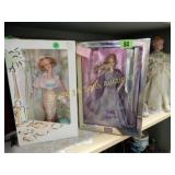 GROUP OF 4 NEW IN BOX BARBIE DOLLS.