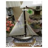 CONTEMPORARY CAST IRON SAILBOAT DOORSTOP.