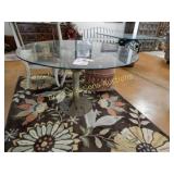 VINTAGE BRONZE TREETRUNK TABLE WITH GLASSTOP.