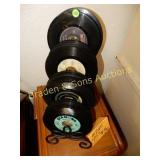 GROUP OF 45 RPM RECORDS IN STAND