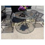 WROUGHT IRON PATIO TABLE WITH 4 MATCHING CHAIRS