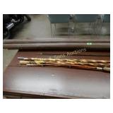 GROUP OF BAMBOO FISHING POLES AND 2 CARRYING