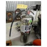 USED FIRE EXTINGUISHER