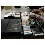 TABLE OF ASSTD VHS & DVD VIDEOS, ETC