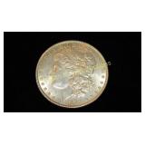 U.S. 1882 MORGAN SILVER DOLLAR, AU QUALITY